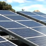 A scenic view of Madagascar’s lush fields and developing infrastructure, highlighting its economic recovery journey