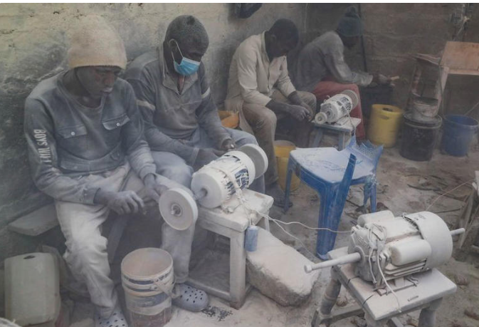 : A market in Kenya with people shopping as prices rise.