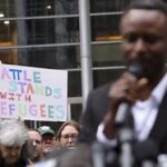 Health workers in protective gear responding to a disease outbreak in a rural Congolese village.