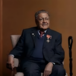 Portrait of Manu Chandaria, Kenyan businessman and philanthropist, known for his contributions to industry and charitable initiatives.