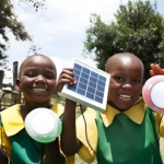 A photo showcasing solar panels, wind turbines, and geothermal steam in East Africa, representing sustainable energy development efforts