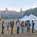 A futuristic AI-powered military command center showcasing autonomous weapons, surveillance technologies, and advanced analytics.