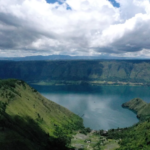 An ancient Stone Age community adapting to harsh, dry conditions after a supervolcano eruption, showcasing their survival ingenuity.