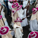 Eyo festival masqueraders walk in Lagos as ethnic tensions rise over federal appointments.