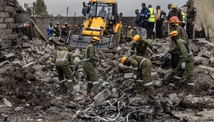 Rescue teams searching wreckage of Amref air ambulance crash site in Ruiru, Kenya