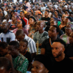 Mourners gather at St. Francis Catholic Church in Owo after 2022 attack.