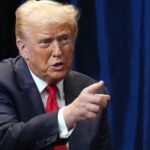 Former US President Donald Trump gestures while speaking at a press event. He has ordered the US military to prepare for possible action against Islamist militants in Nigeria.