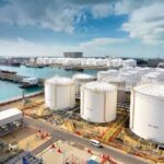 Former Nigeria’s petroleum minister Timipre Sylva attending an official event in Abuja, wearing a coat and neck scarf, amid controversy over an EFCC wanted notice.