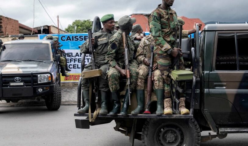 Members of the M23 rebel group standing on vehicles during an event in Goma, North Kivu province, Democratic Republic of the Congo, April 7, 2025
