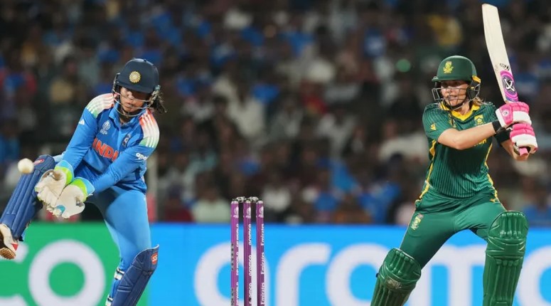 Indian women’s cricket team celebrates after defeating South Africa by 52 runs to win the ICC Women’s ODI World Cup 2025 final at DY Patil Stadium, Navi Mumbai.