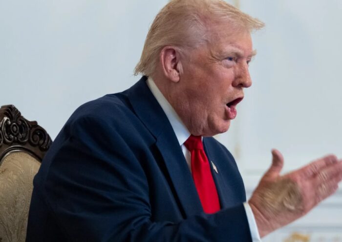 U.S. President Donald Trump speaks with service members from Mar-a-Lago during the Thanksgiving holiday.