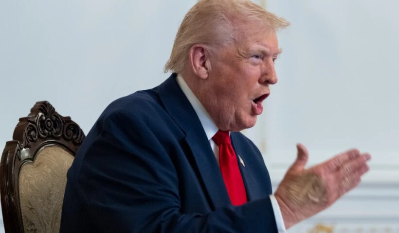 U.S. President Donald Trump speaks with service members from Mar-a-Lago during the Thanksgiving holiday.