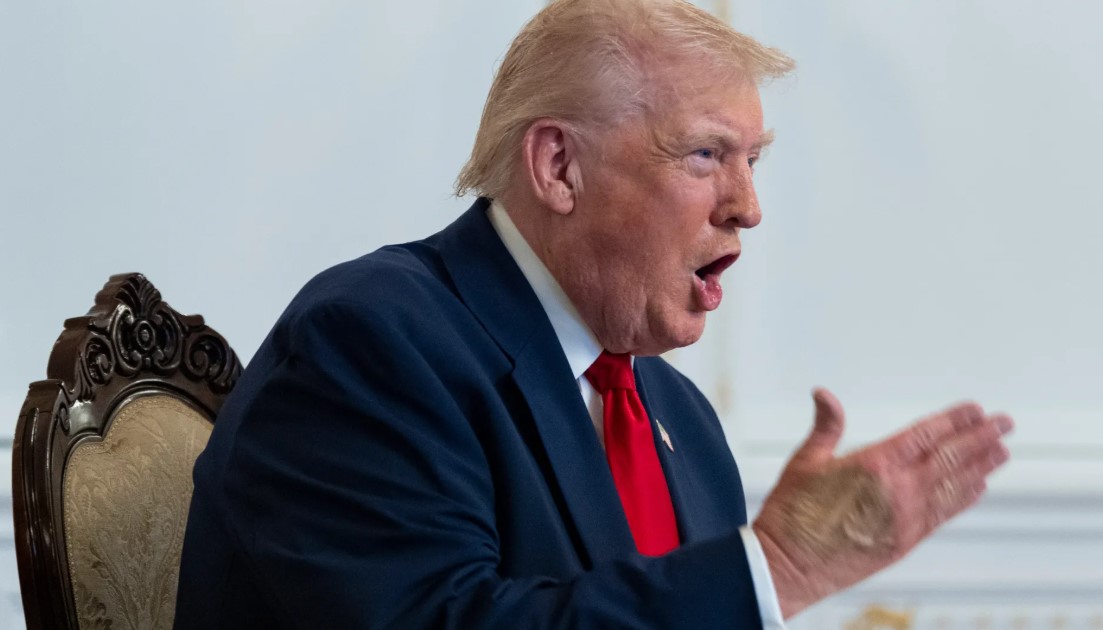 U.S. President Donald Trump speaks with service members from Mar-a-Lago during the Thanksgiving holiday.