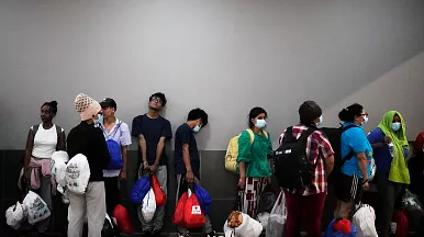 Ghanaian officials discuss the arrival of West African migrants deported from the United States