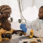Health workers respond to a cholera outbreak affecting communities in Africa.