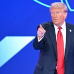 US President Donald Trump arrives to speak at a rally on the economy in Pennsylvania, December 2025.