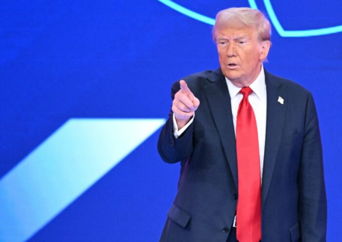 US President Donald Trump arrives to speak at a rally on the economy in Pennsylvania, December 2025.