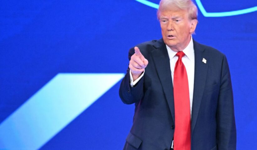 US President Donald Trump arrives to speak at a rally on the economy in Pennsylvania, December 2025.