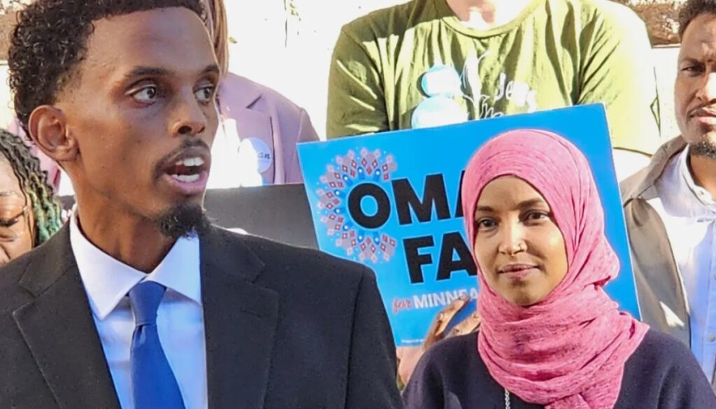 Somali American leaders, including Omar Fateh and Ilhan Omar, speak at a news conference responding to Donald Trump’s remarks.