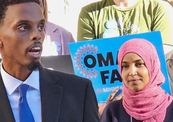 Somali American leaders, including Omar Fateh and Ilhan Omar, speak at a news conference responding to Donald Trump’s remarks.
