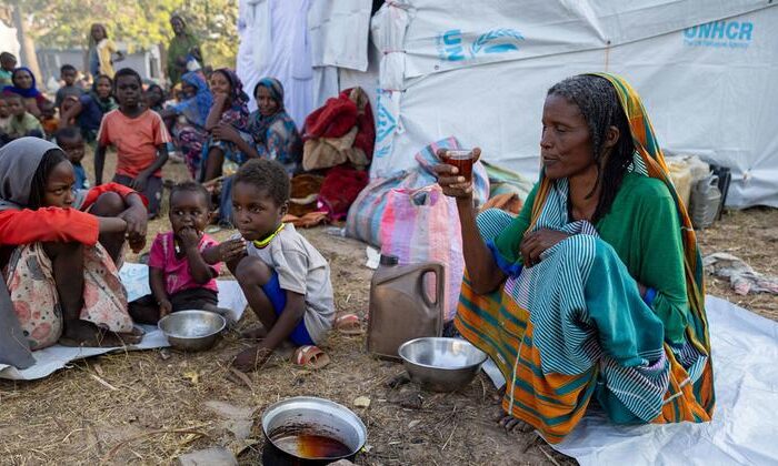 Sudan war 1000 days showing civilians displaced by ongoing conflict.