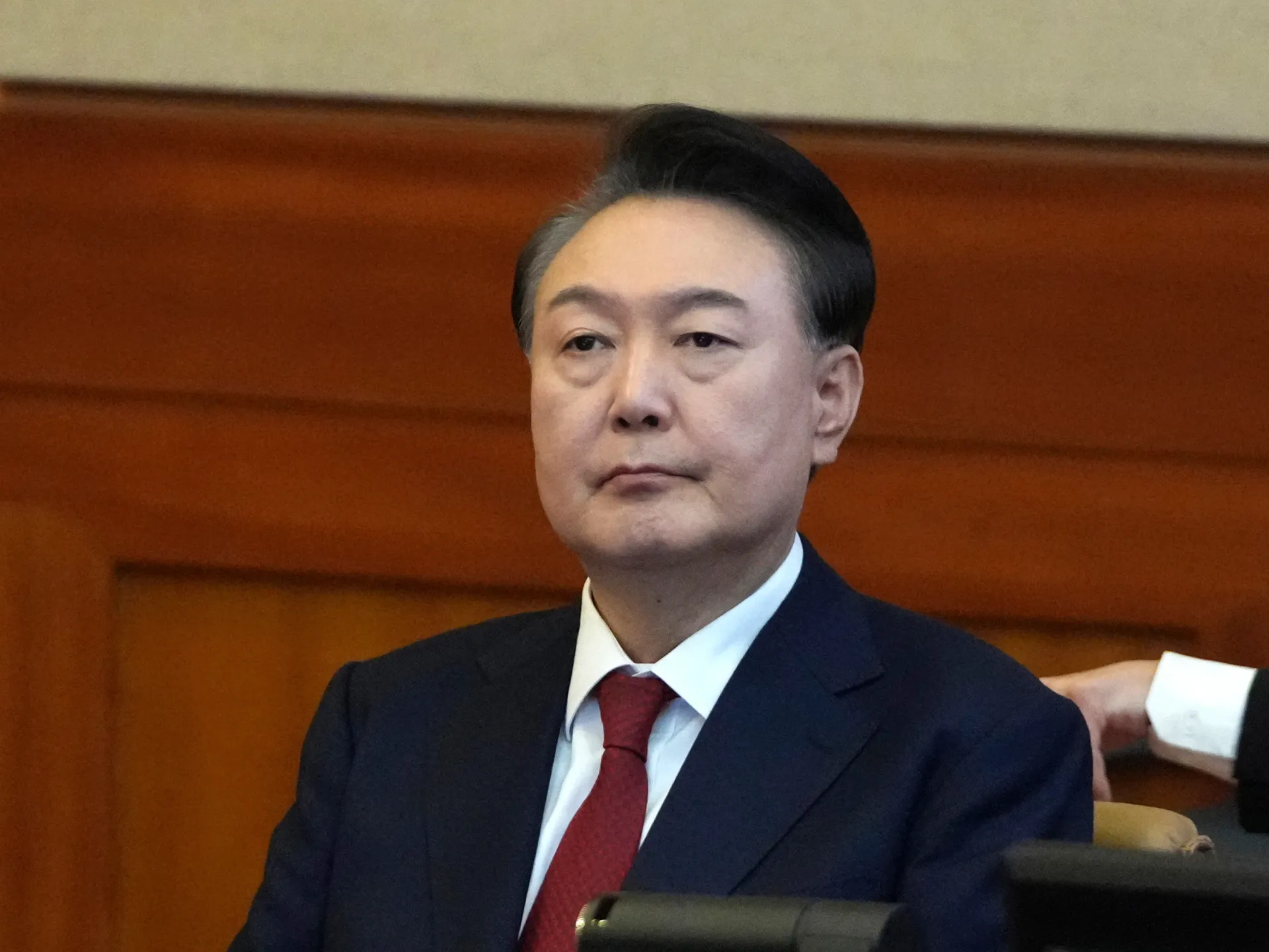 Former South Korean president Yoon Suk Yeol appears in court after his insurrection conviction